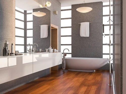 A luxurious bathroom with a custom-built wooden vanity and double sinks.